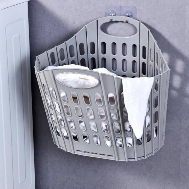 Foldable clothes basket in bedroom