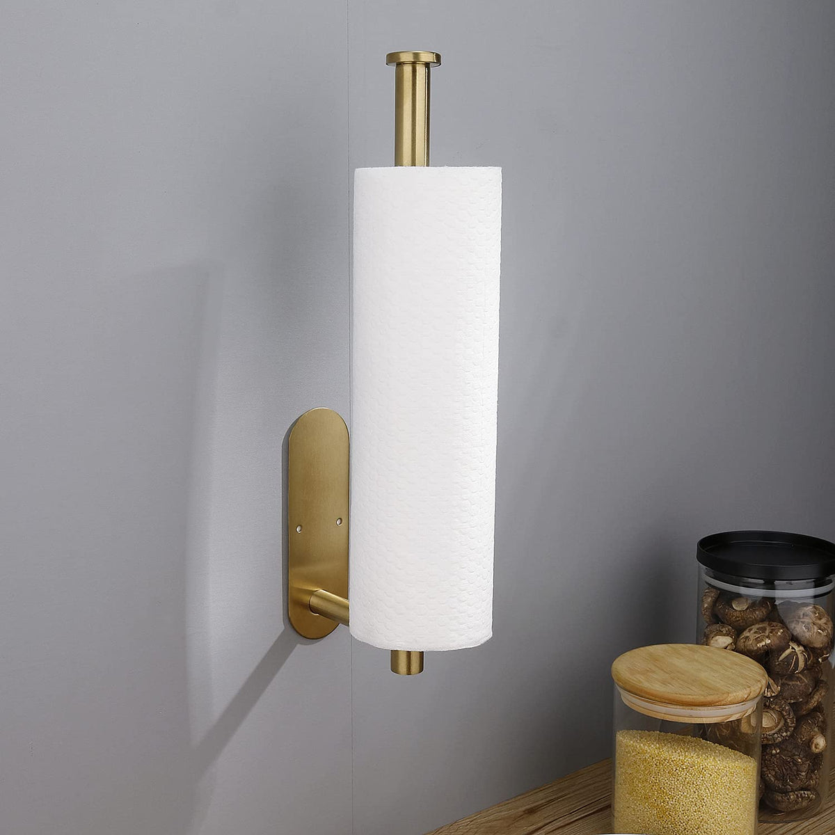 Adhesive backing of the paper towel holder