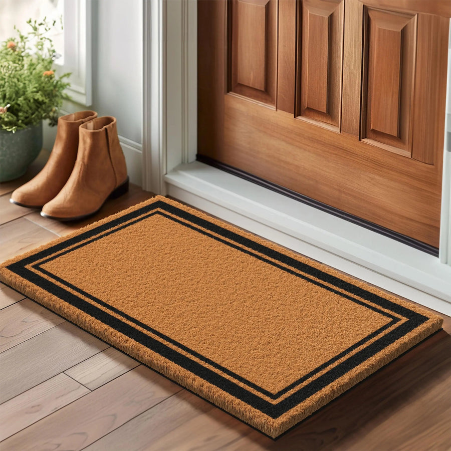 Natural coir doormat with brown border