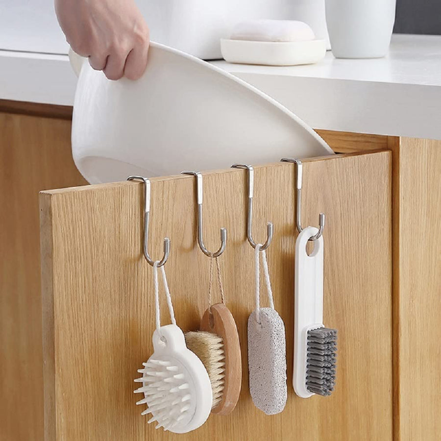 Stainless steel S hook over a cabinet door