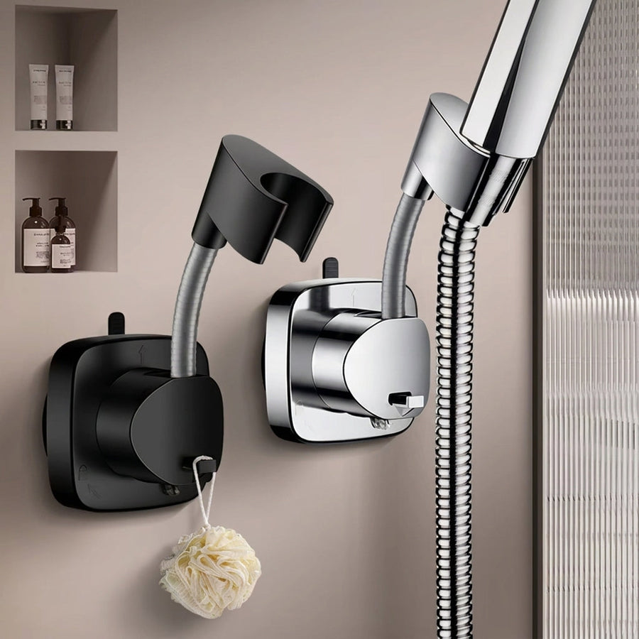 Adjustable shower head holder mounted on tiled wall