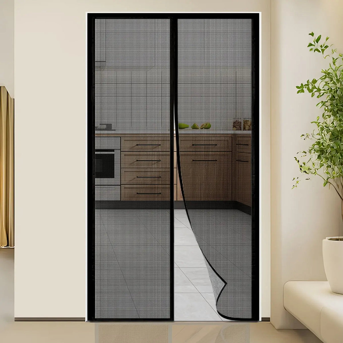 Magnetic mesh screen door fitted in a doorway