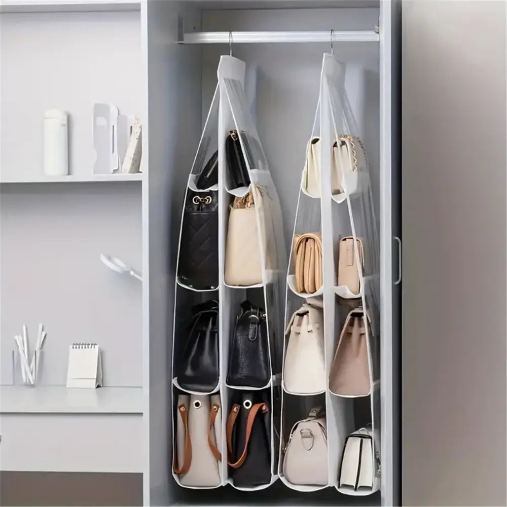 Hanging handbag organiser in wardrobe