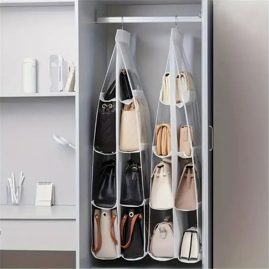 Hanging handbag organiser in wardrobe