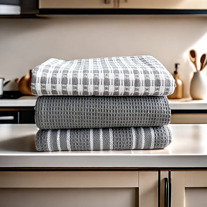 Cotton kitchen towels on counter
