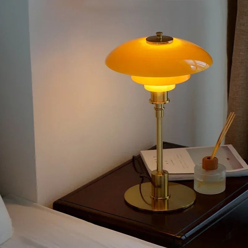 Nordic tiered glass table lamp on a desk