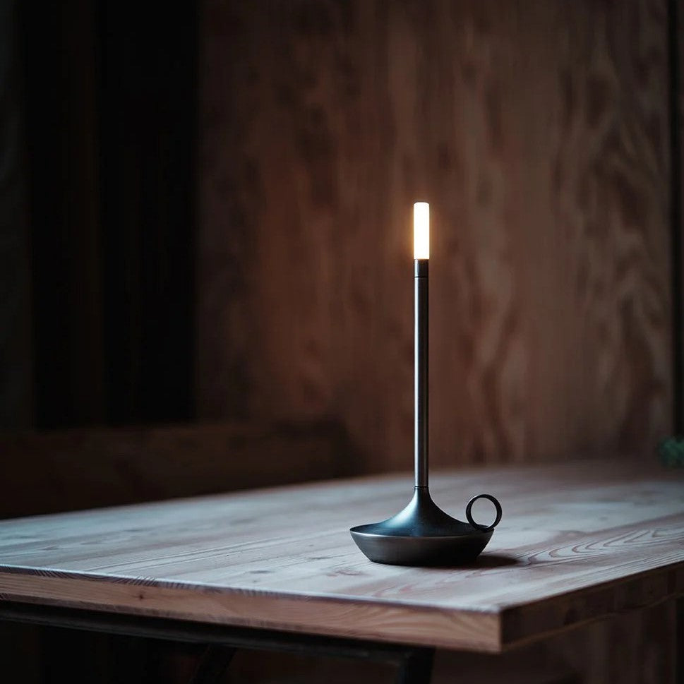 Candlestick lamp glowing at dinner