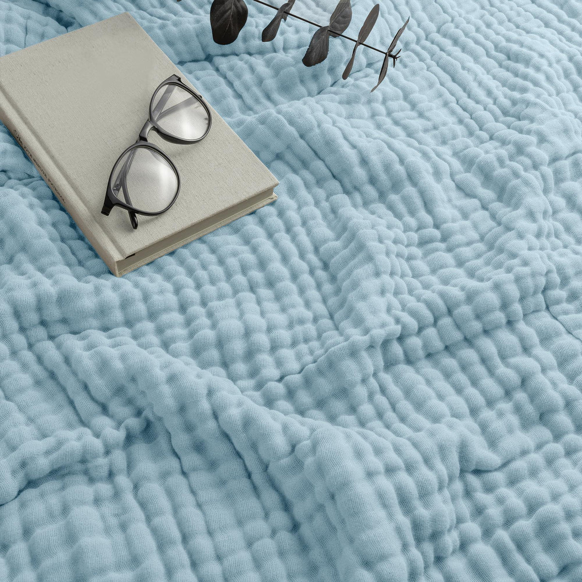 Muslin throw folded showing layers