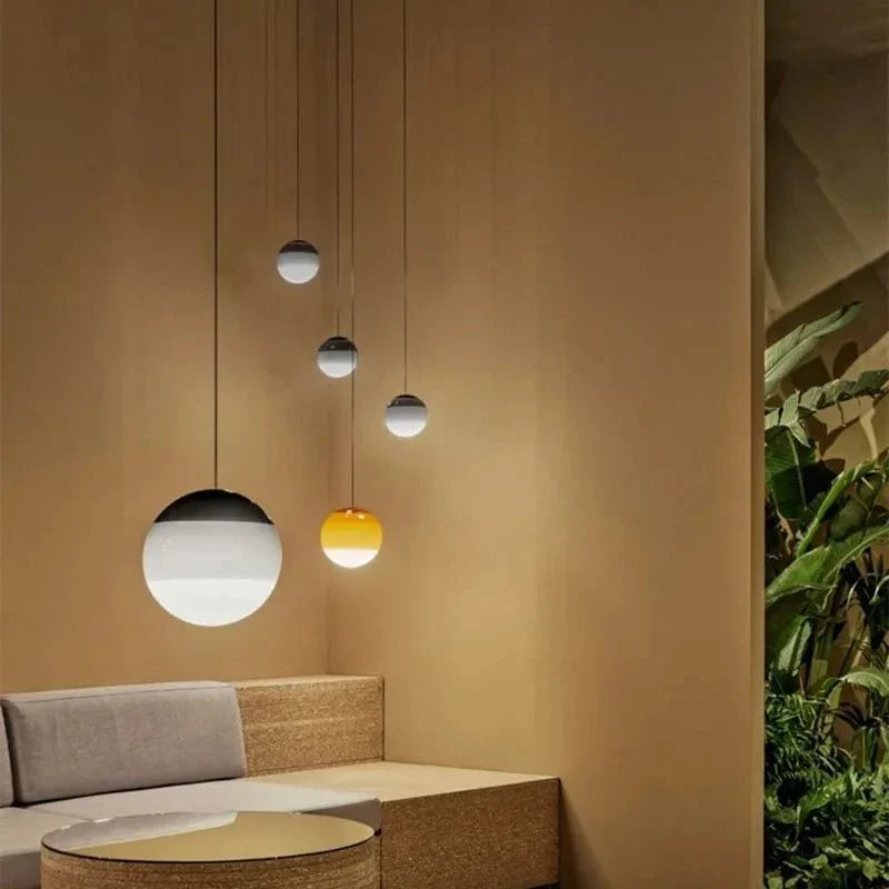 Coloured ombré pendant lights cluster